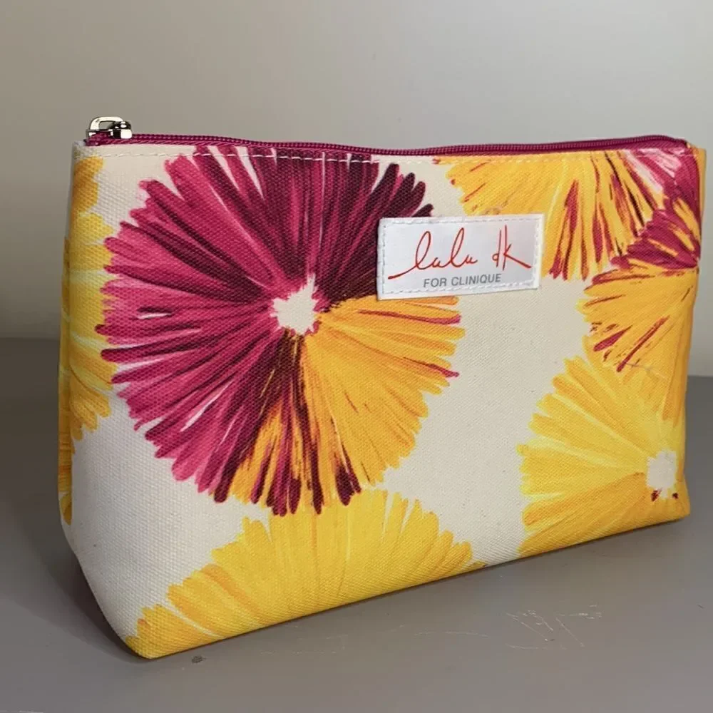 EUC Clinique LaLa DK makeup bag